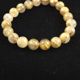 ゴールドルチルクォーツ AAAA 9.5mm玉ブレスレット 25.7g (ID:10805)