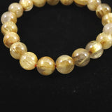 ゴールドルチルクォーツ AAAA 9.5mm玉ブレスレット 25.7g (ID:10805)