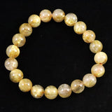 ゴールドタイチンルチルクォーツ AAAA 9.5mm玉ブレスレット 25.7g (ID:10805)
