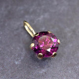 パープルガーネット 5mmラウンド ペンダントトップ チャーム K18YG  0.69ct (ID:14387)
