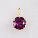 パープルガーネット 5mmラウンド ペンダントトップ チャーム K18YG  0.69ct (ID:14387)