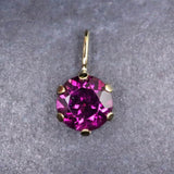 パープルガーネット 5mmラウンド ペンダントトップ チャーム K18YG  0.69ct (ID:14387)
