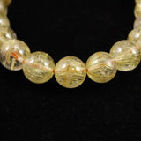 ゴールドルチルクォーツ 3A 9mm玉ブレスレット 22.5g (ID:14905)