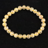 ゴールドタイチンルチルクォーツ 3A 7mm玉ブレスレット 13.2g (ID:14930)
