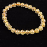 ゴールドタイチンルチルクォーツ 3A 7mm玉ブレスレット 13.2g (ID:14930)