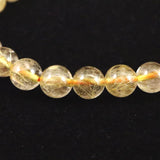 ゴールドタイチンルチルクォーツ 3A 7mm玉ブレスレット 13.2g (ID:14930)