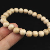 ホワイトドラゴンアイ ウッドビーズ 8mm玉ブレスレット 証明書付 4.25g (ID:16454)
