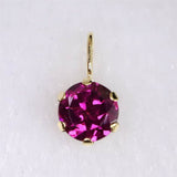 パープルガーネット 5mmラウンド ペンダントトップ チャーム K18YG  0.69ct (ID:25428)