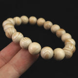 ホワイトドラゴンアイ ウッドビーズ 10mm玉ブレスレット 証明書付 6.0g (ID:27853)