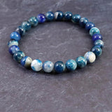 ブルーハックマナイトシリカ 蛍光 7.5mm玉ブレスレット 14.1g (ID:29152)