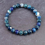 ブルーハックマナイトシリカ 蛍光 7.5mm玉ブレスレット 14.1g (ID:29152)