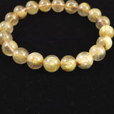 ゴールドルチルクォーツ 3A 9mm玉ブレスレット 24.2g (ID:29509)