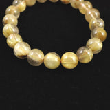 ゴールドルチルクォーツ 3A 9mm玉ブレスレット 24.2g (ID:29509)