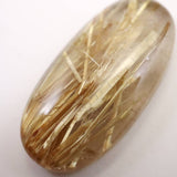 ゴールド タイチンルチル クォーツ 23.5mmオーバル ルース 13.56ct (ID:30334)