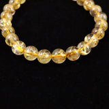 ゴールドタイチンルチルクォーツ 3A 7mm玉ブレスレット 13.0g (ID:31042)