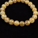 ゴールドルチルクォーツ 3A 9mm玉ブレスレット 22.4g (ID:31250)