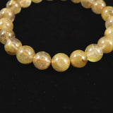 ゴールドルチルクォーツ 3A 9mm玉ブレスレット 22.4g (ID:31250)