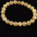ゴールドタイチンルチルクォーツ 3A 8mm玉ブレスレット 17.1g (ID:31504)