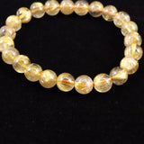 ゴールドタイチンルチルクォーツ 3A 8mm玉ブレスレット 17.1g (ID:31504)