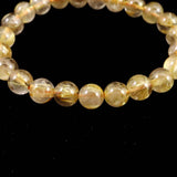 ゴールドタイチンルチルクォーツ 3A 8mm玉ブレスレット 17.1g (ID:31504)