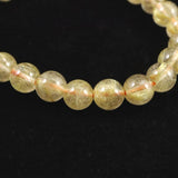 ゴールドルチルクォーツ 3A 7.5mm玉ブレスレット 15.6g (ID:34855)