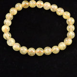 ゴールドルチルクォーツ 3A 7.5mm玉ブレスレット 15.6g (ID:34855)