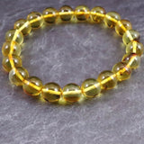 天然琥珀 バルティックアンバー 虫入り　アンバー  9.5mm玉ブレスレット 10.2g (ID:39047)