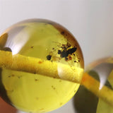 天然琥珀 バルティックアンバー 虫入り　アンバー  9.5mm玉ブレスレット 10.2g (ID:39047)