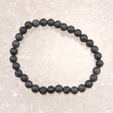 富士溶岩石 気泡なし 6mm玉ブレスレット 証明書付 10.7g (ID:40451)