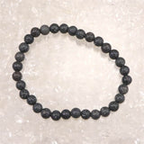 富士溶岩石 気泡なし 6mm玉ブレスレット 証明書付 10.7g (ID:40451)