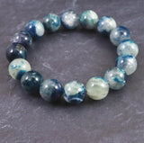 ブルーハックマナイトシリカ 蛍光 12.5mm玉ブレスレット 41.7g (ID:43233)