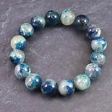 ブルーハックマナイトシリカ 蛍光 12.5mm玉ブレスレット 41.7g (ID:43233)