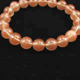 チベット産 ピンクブラウン シラー アンデシン  9.5mm玉ブレスレット 24.79g (ID:46275)