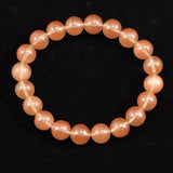 チベット産 ピンクブラウン シラー アンデシン  9.5mm玉ブレスレット 24.79g (ID:46275)