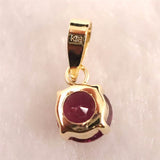 ロードライトガーネット 5mmラウンド ペンダントトップ チャーム K18YG  0.63ct (ID:46625)