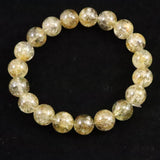 ゴールデンスキャポライト 黄金柱石　10.5mm玉ブレスレット 31.5g  (ID:48599)