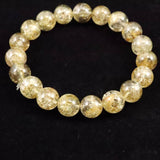 ゴールデンスキャポライト 黄金柱石　10.5mm玉ブレスレット 31.5g  (ID:48599)