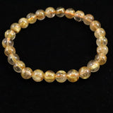 ゴールドタイチンルチルクォーツ AAA 7mm玉ブレスレット 13.1g (ID:53880)