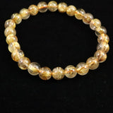 ゴールドタイチンルチルクォーツ AAA 7mm玉ブレスレット 13.1g (ID:53880)