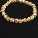ゴールドタイチンルチルクォーツ AAA 7mm玉ブレスレット 13.1g (ID:53880)