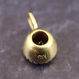 ガーネット 3mmラウンド ペンダントトップ チャーム K18YG  0.26g (ID:54055)