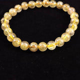 ゴールドタイチンルチルクォーツ 3A 7mm玉ブレスレット 13.1g (ID:55680)