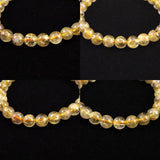 ゴールドタイチンルチルクォーツ 3A 7mm玉ブレスレット 13.1g (ID:55680)