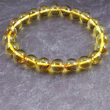 天然琥珀 バルティックアンバー 虫入り　アンバー  8.5mm玉ブレスレット 8.2g (ID:82243)