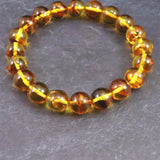 天然琥珀 バルティックアンバー  9.5mm玉ブレスレット 9.9g (ID:84202)