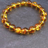 天然琥珀 バルティックアンバー  9.5mm玉ブレスレット 9.9g (ID:84202)