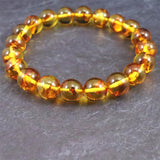 天然琥珀 バルティックアンバー  9.5mm玉ブレスレット 9.9g (ID:84202)