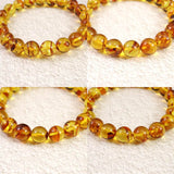 天然琥珀 バルティックアンバー  9.5mm玉ブレスレット 9.9g (ID:84202)
