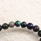 ブラックプレシャスオパール 5.5mm玉ブレスレット 5.2g (ID:84290)