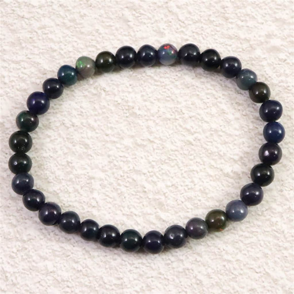 ブラックプレシャスオパール 5.5mm玉ブレスレット 5.2g (ID:84290)